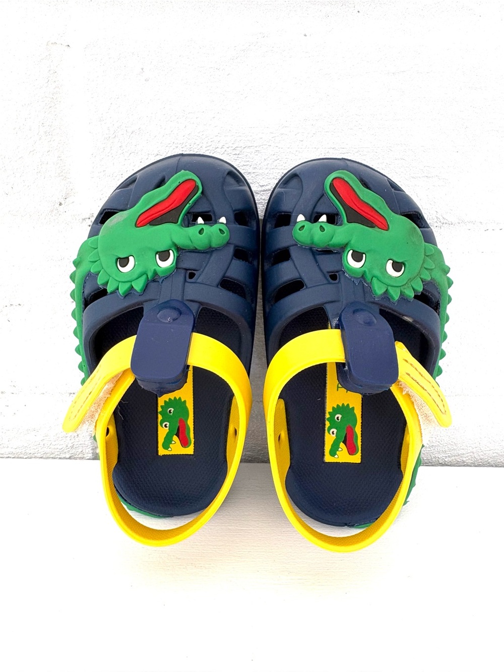 Grendene Kids Navy and Yellow Croc-Style Sandals with Green Crocodile Accent